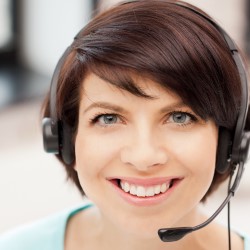 Woman wearing telephone headset